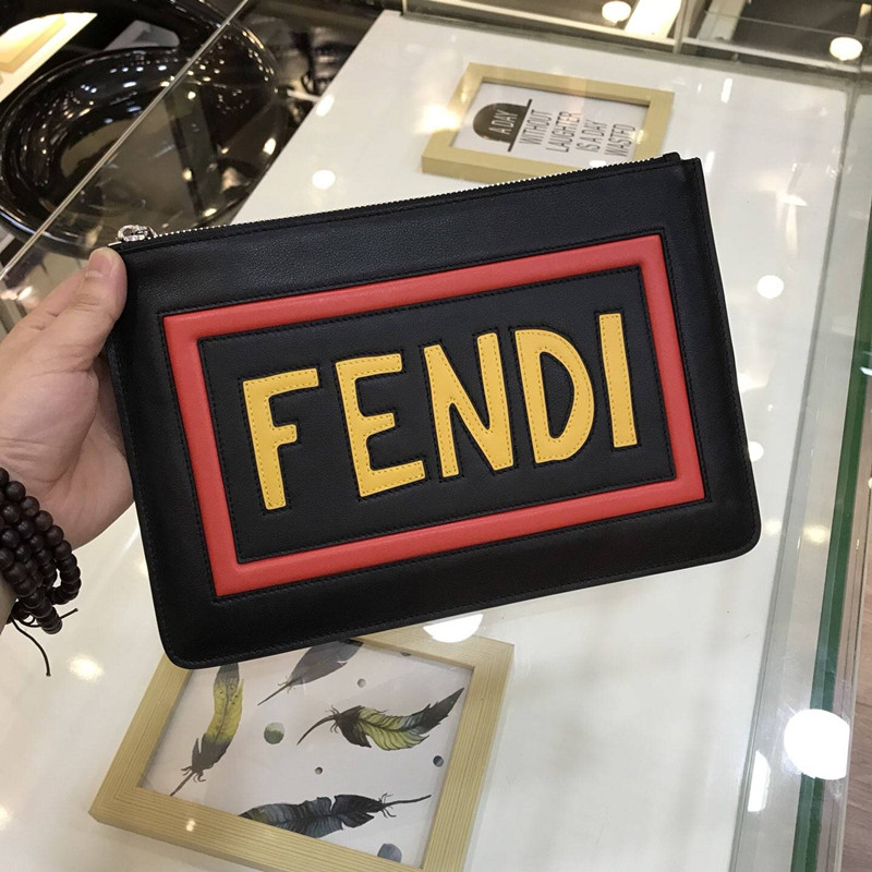 FENDI 芬迪 男士手拿包進口頭層全粒面牛皮 字母開模雕刻 專櫃對比￥980.00的图片-高仿芬迪包包Fendi