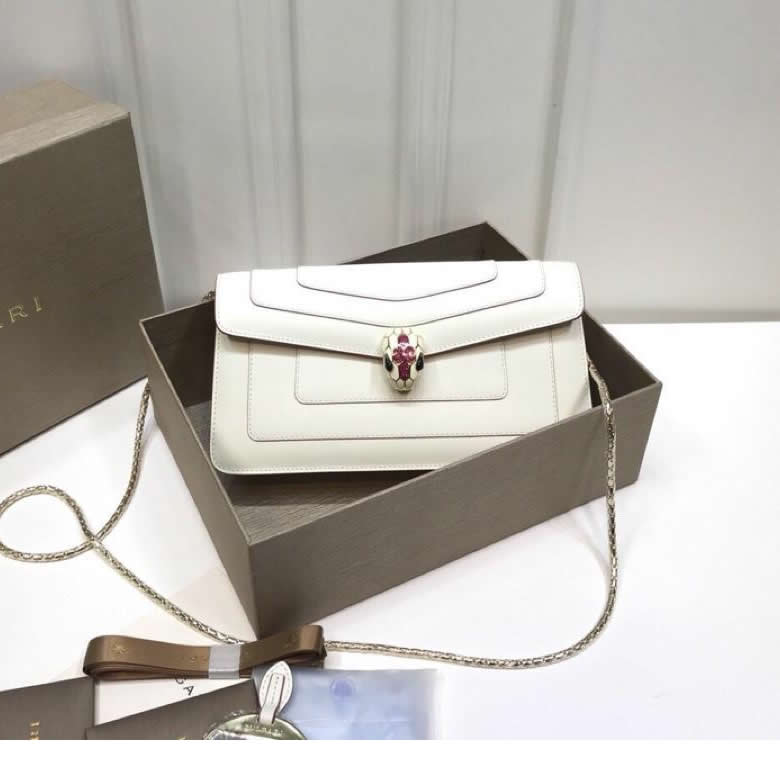 25cm原單寶格麗Serpenti 琺瑯單層蛇頭包 B286167粉/白/黃￥1980.00的图片-高仿寶格麗包包Bulgari