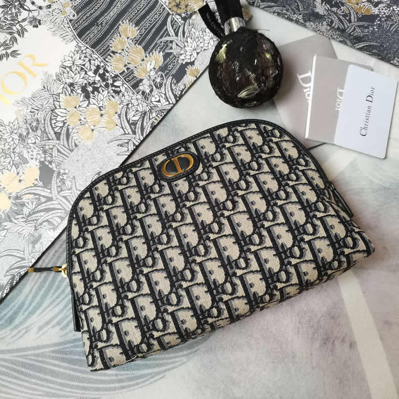 高仿dior化妝包藍色Oblique印花￥980.00的图片-高仿迪奧包包DIOR、高仿迪奧女包DIOR