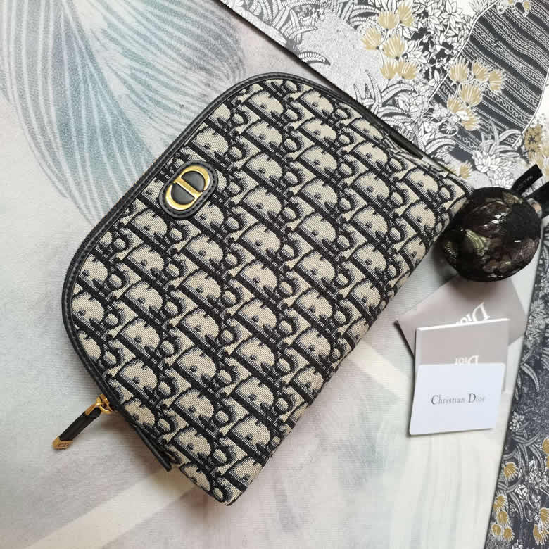 高仿dior化妝包藍色Oblique印花￥980.00的图片-高仿迪奧包包DIOR、高仿迪奧女包DIOR