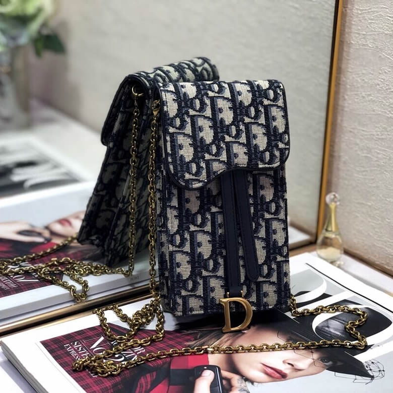 迪奧專櫃手機包藍色提花帆佈手拿包S5641CTZQ_M928￥880.00的图片-高仿迪奧包包DIOR、高仿迪奧女包DIOR