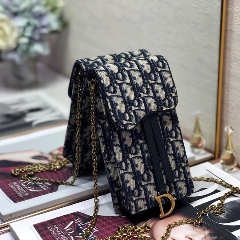 迪奧專櫃手機包藍色提花帆佈手拿包S5641CTZQ_M928￥880.00的图片-高仿迪奧包包DIOR、高仿迪奧女包DIOR