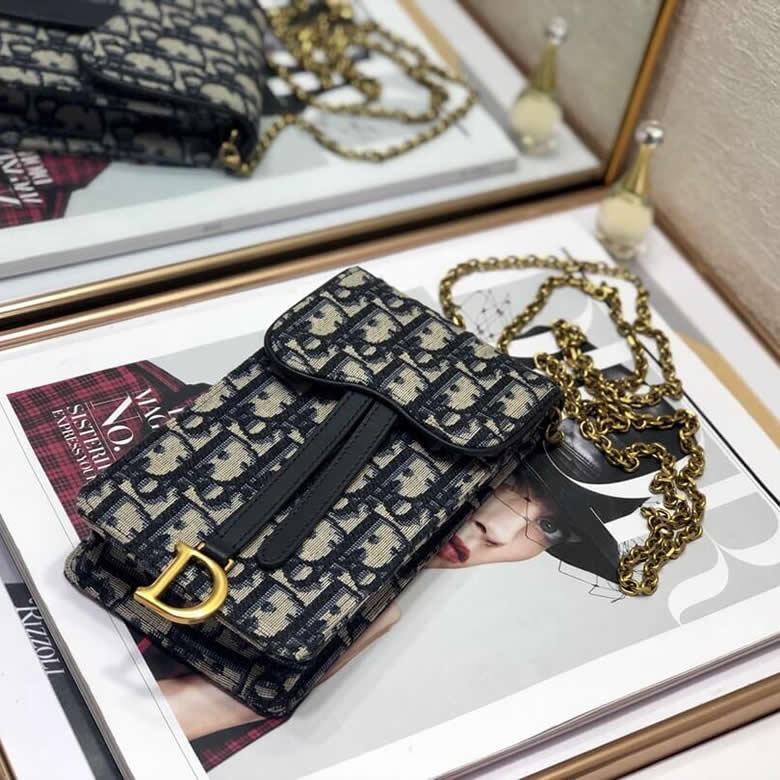 迪奧專櫃手機包藍色提花帆佈手拿包S5641CTZQ_M928￥880.00的图片-高仿迪奧包包DIOR、高仿迪奧女包DIOR