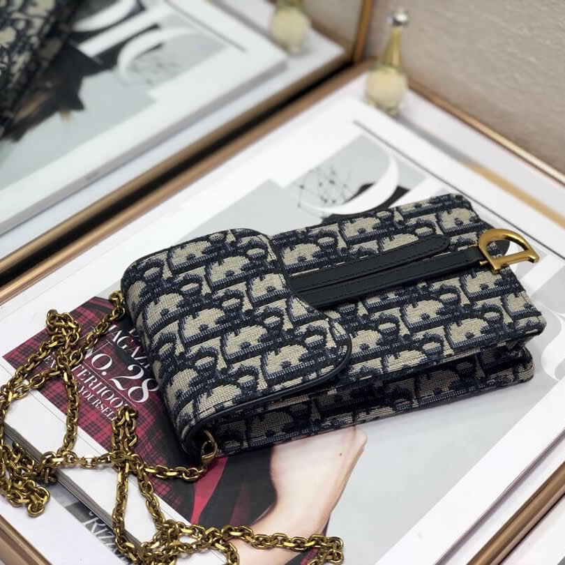 迪奧專櫃手機包藍色提花帆佈手拿包S5641CTZQ_M928￥880.00的图片-高仿迪奧包包DIOR、高仿迪奧女包DIOR