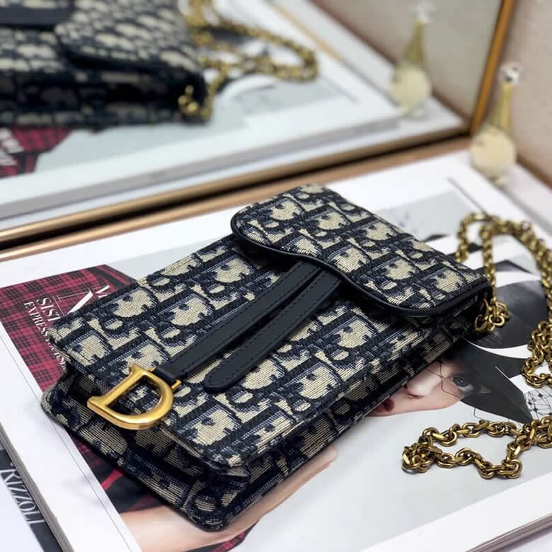 迪奧專櫃手機包藍色提花帆佈手拿包S5641CTZQ_M928￥880.00的图片-高仿迪奧包包DIOR、高仿迪奧女包DIOR