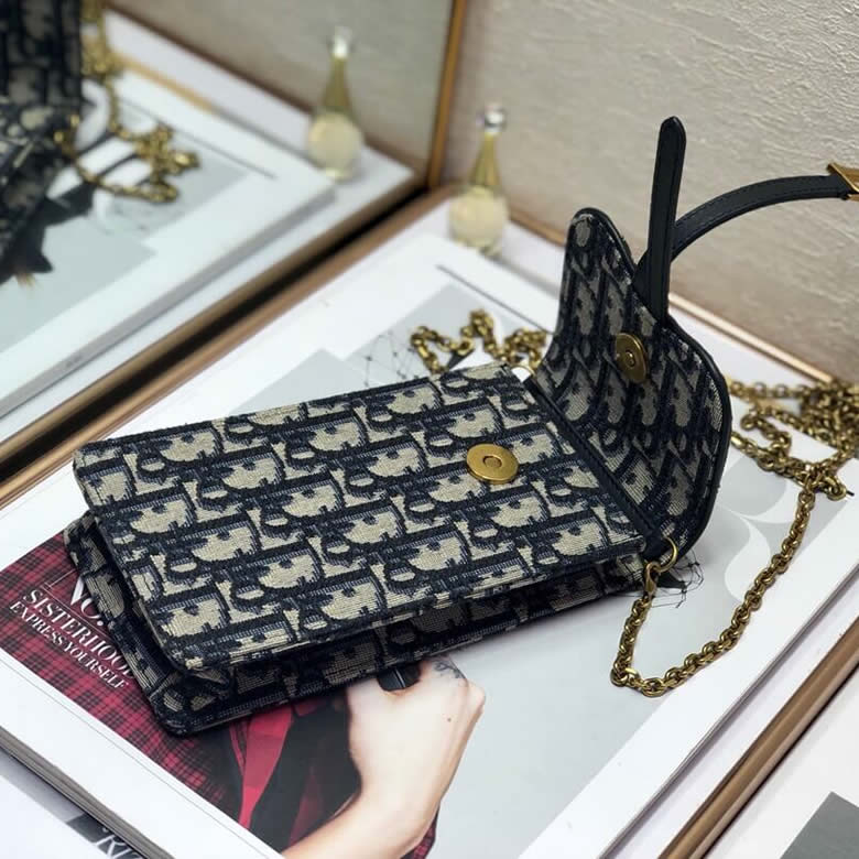 迪奧專櫃手機包藍色提花帆佈手拿包S5641CTZQ_M928￥880.00的图片-高仿迪奧包包DIOR、高仿迪奧女包DIOR