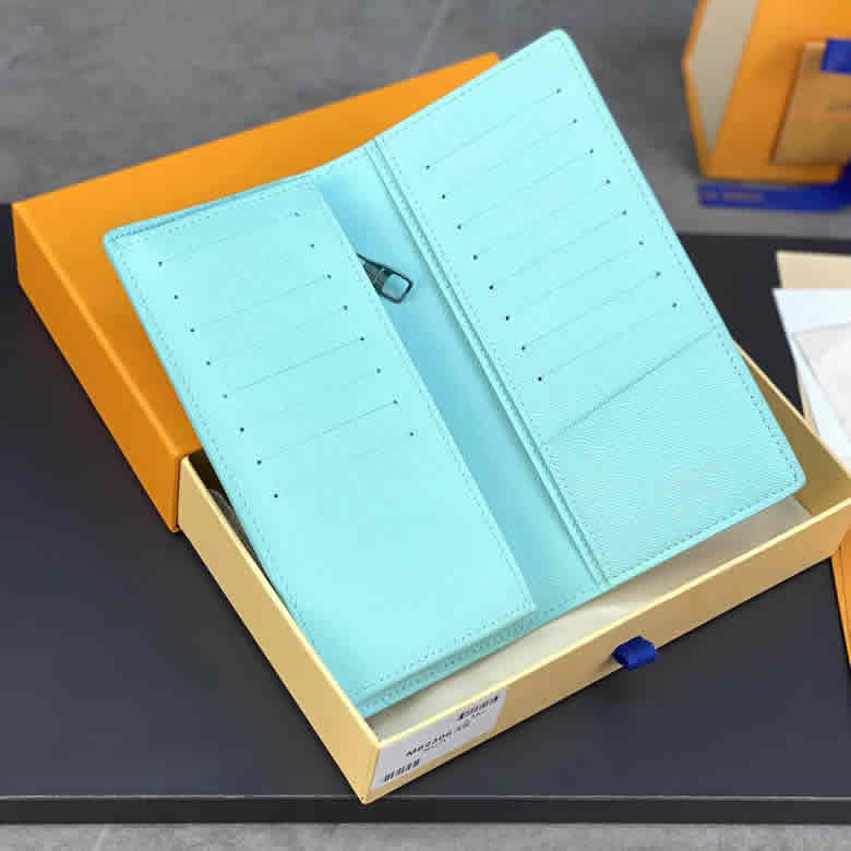 LV/路易威登男包藍色水滴字母帆佈雙摺收納長款錢包手拿包M82306¥680.00的图片-高仿LV包包、高仿lv錢包 LV/路易威登男包藍色水滴字母帆佈雙摺收納長款錢包手拿包M82306¥680.00的图片-高仿LV包包、高仿lv錢包