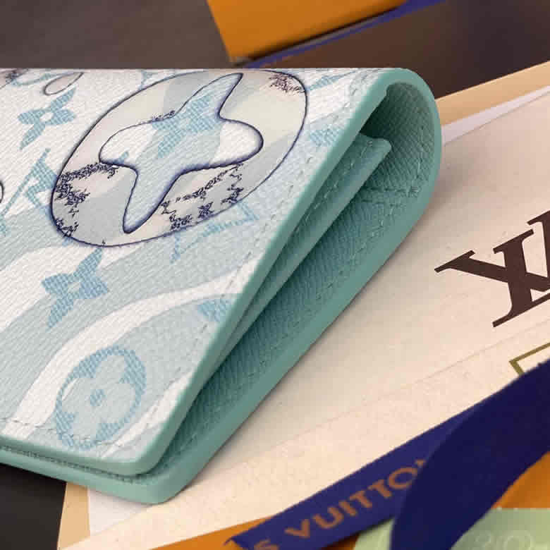 LV/路易威登男包藍色水滴字母帆佈雙摺收納長款錢包手拿包M82306¥680.00的图片-高仿LV包包、高仿lv錢包 LV/路易威登男包藍色水滴字母帆佈雙摺收納長款錢包手拿包M82306¥680.00的图片-高仿LV包包、高仿lv錢包