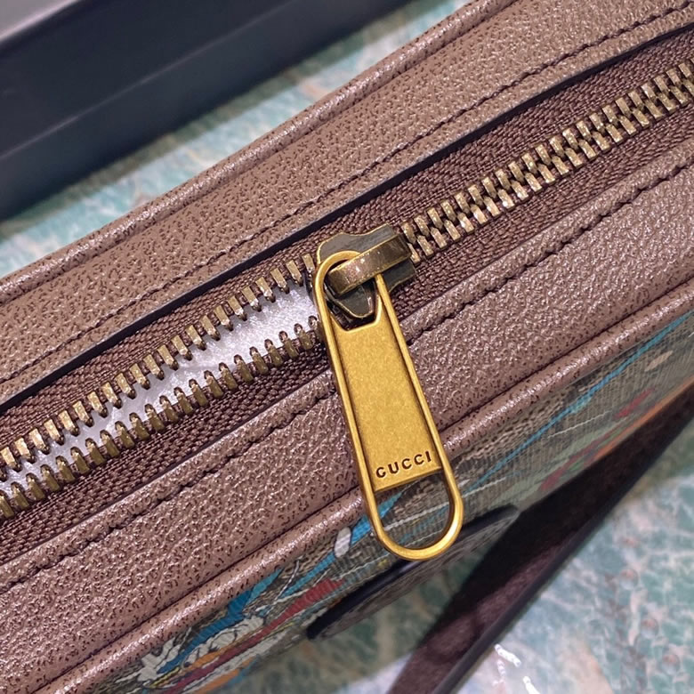 古馳男包Disney x Gucci唐老鴨印花迷妳肩背包 648124￥1280.00的图片-高仿古奇包包Gucci、高仿古奇男包Gucci