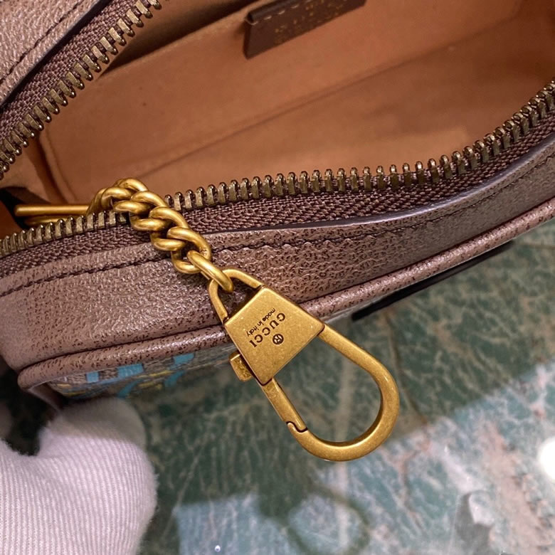 古馳男包Disney x Gucci唐老鴨印花迷妳肩背包 648124￥1280.00的图片-高仿古奇包包Gucci、高仿古奇男包Gucci