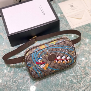 古馳男包Disney x Gucci唐老鴨印花迷妳肩背包 648124￥1280.00的图片-高仿古奇包包Gucci、高仿古奇男包Gucci
