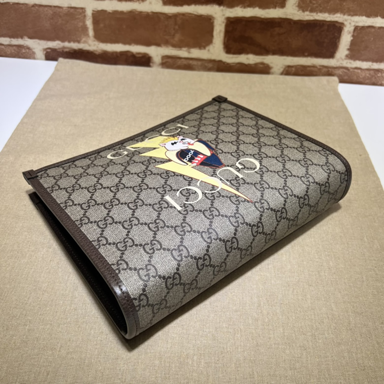 高仿GUCCI古馳印花手拿包703805￥980.00的图片-高仿古奇包包Gucci、高仿古奇錢包Gucci