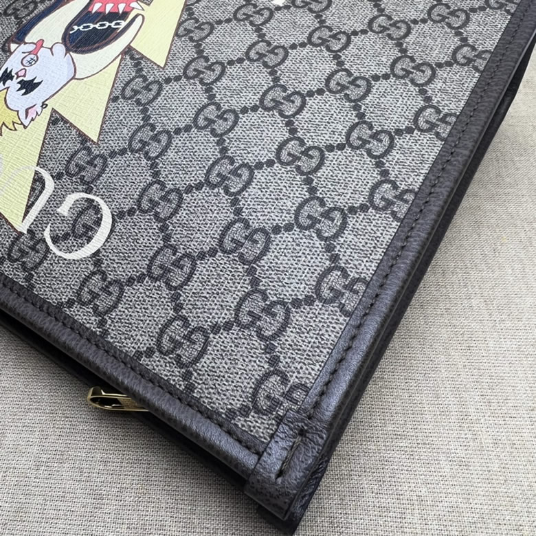 高仿GUCCI古馳印花手拿包703805￥980.00的图片-高仿古奇包包Gucci、高仿古奇錢包Gucci