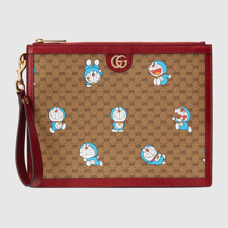 古奇哆啦A夢機器貓男女同款高仿信封包手拿包手包654503￥980.00的图片-高仿古奇包包Gucci、高仿古奇錢包Gucci