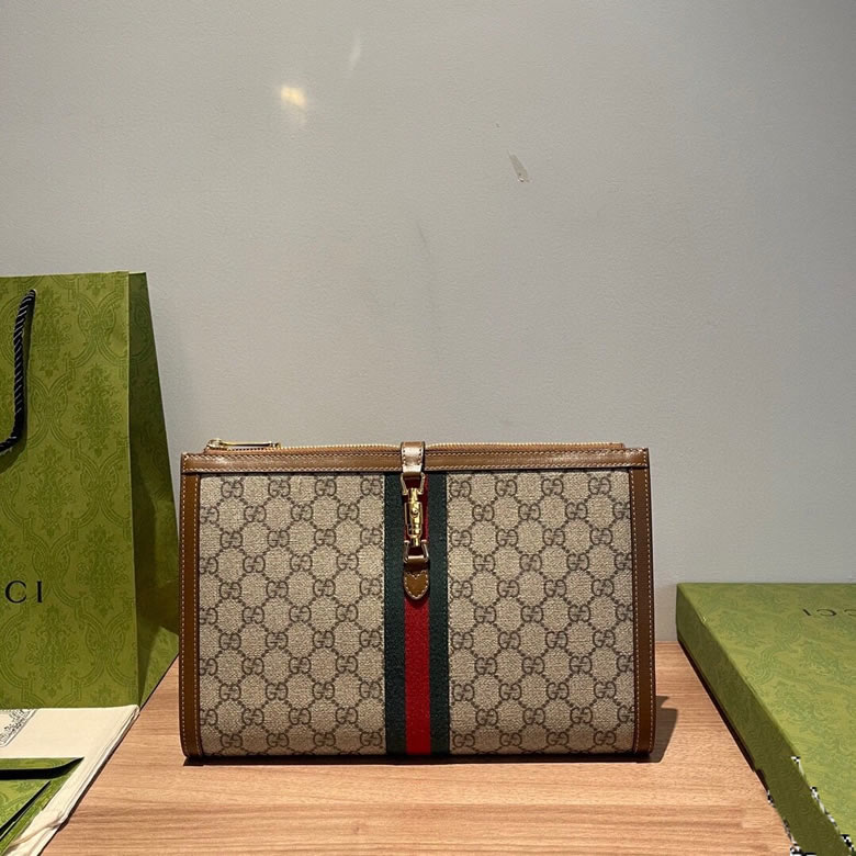 原單古奇拉鏈手拿包647332啡棕￥980.00的图片-高仿古奇包包Gucci、高仿古奇錢包Gucci