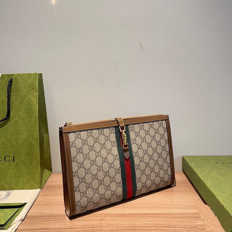 原單古奇拉鏈手拿包647332啡棕￥980.00的图片-高仿古奇包包Gucci、高仿古奇錢包Gucci