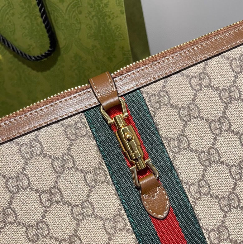 原單古奇拉鏈手拿包647332啡棕￥980.00的图片-高仿古奇包包Gucci、高仿古奇錢包Gucci