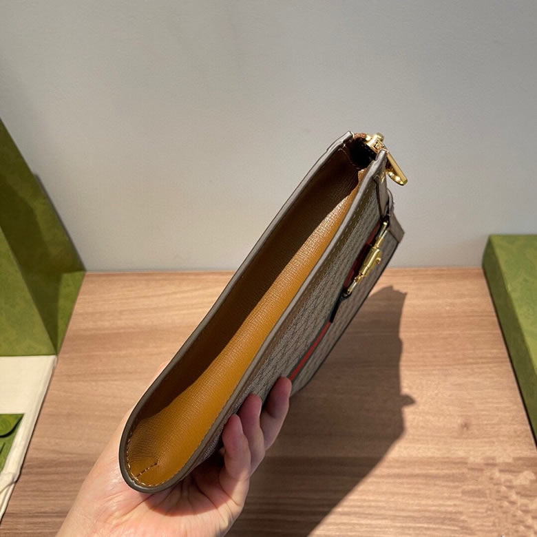 原單古奇拉鏈手拿包647332啡棕￥980.00的图片-高仿古奇包包Gucci、高仿古奇錢包Gucci