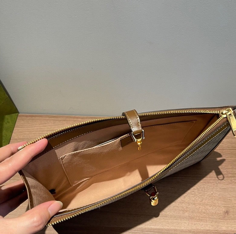 原單古奇拉鏈手拿包647332啡棕￥980.00的图片-高仿古奇包包Gucci、高仿古奇錢包Gucci