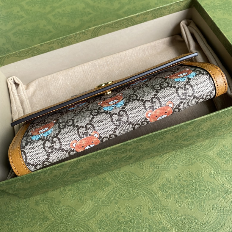 原單gucci最新款印花泰迪熊圖案繫列翻蓋式錢包647786￥1280.00的图片-高仿古奇包包Gucci、高仿古奇錢包Gucci