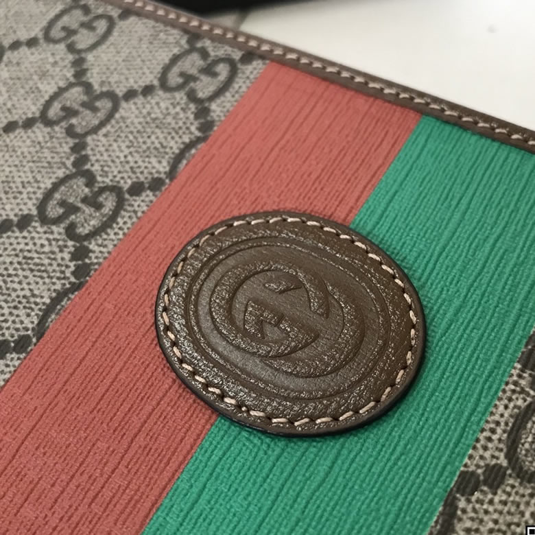 Gucci手包 Fake/Not印花手拿包 636171￥980.00的图片-高仿古奇包包Gucci、高仿古奇錢包Gucci