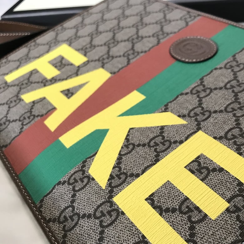 Gucci手包 Fake/Not印花手拿包 636171￥980.00的图片-高仿古奇包包Gucci、高仿古奇錢包Gucci
