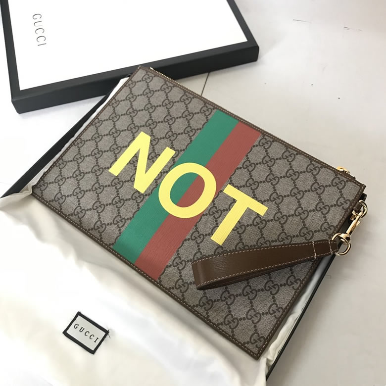 Gucci手包 Fake/Not印花手拿包 636171￥980.00的图片-高仿古奇包包Gucci、高仿古奇錢包Gucci