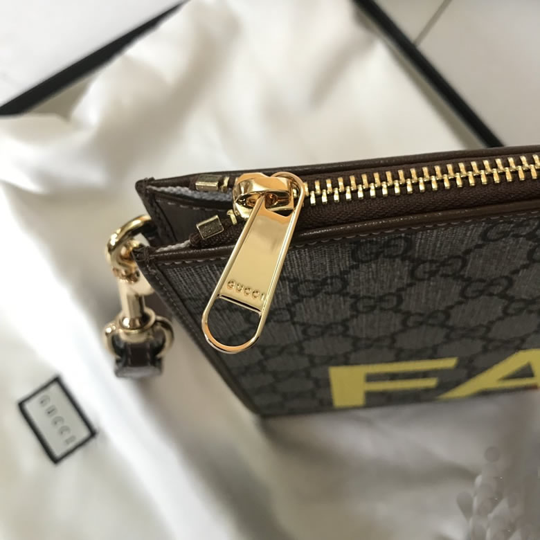 Gucci手包 Fake/Not印花手拿包 636171￥980.00的图片-高仿古奇包包Gucci、高仿古奇錢包Gucci