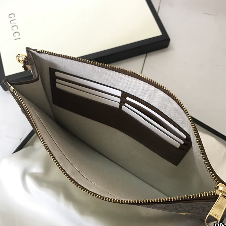 Gucci手包 Fake/Not印花手拿包 636171￥980.00的图片-高仿古奇包包Gucci、高仿古奇錢包Gucci