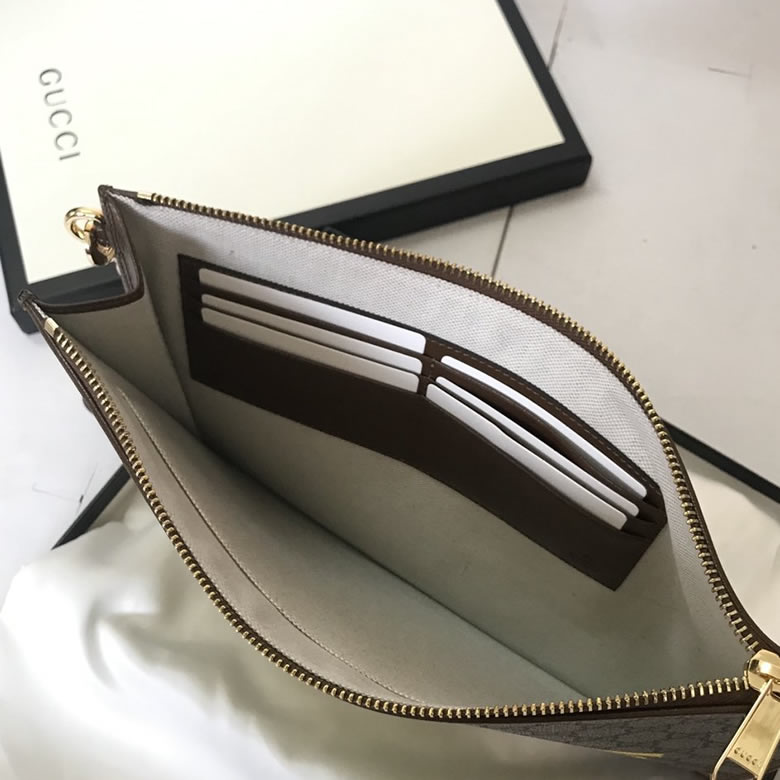 Gucci手包 Fake/Not印花手拿包 636171￥980.00的图片-高仿古奇包包Gucci、高仿古奇錢包Gucci