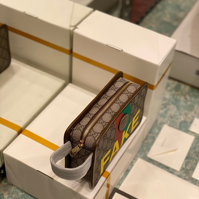 原單Gucci手包Fake/Not印花手拿包 636243￥980.00的图片-高仿古奇包包Gucci、高仿古奇錢包Gucci