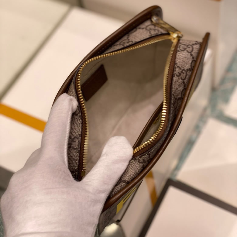 原單Gucci手包Fake/Not印花手拿包 636243￥980.00的图片-高仿古奇包包Gucci、高仿古奇錢包Gucci