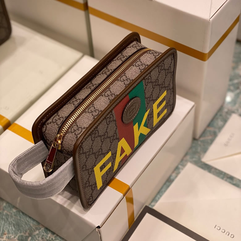 原單Gucci手包Fake/Not印花手拿包 636243￥980.00的图片-高仿古奇包包Gucci、高仿古奇錢包Gucci