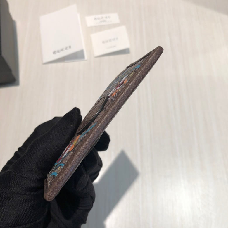 古馳卡包Disney x Gucci唐老鴨印花卡片夾 647942¥880.00的图片-高仿古奇包包Gucci、高仿古奇錢包Gucci 古馳卡包Disney x Gucci唐老鴨印花卡片夾 647942¥880.00的图片-高仿古奇包包Gucci、高仿古奇錢包Gucci