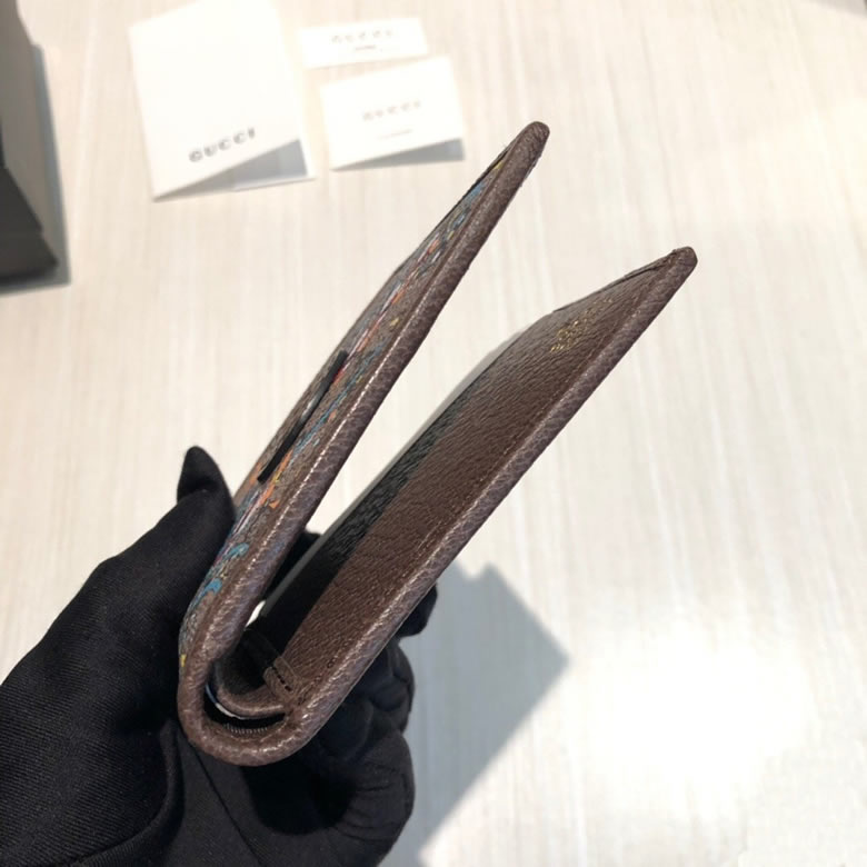 古馳錢包Disney x Gucci唐老鴨印花雙摺錢包 647937￥880.00的图片-高仿古奇包包Gucci、高仿古奇錢包Gucci