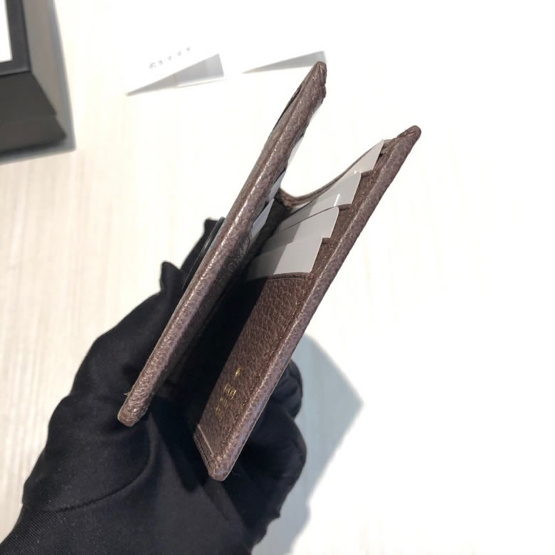 古馳錢包Disney x Gucci唐老鴨印花雙摺錢包 647937￥880.00的图片-高仿古奇包包Gucci、高仿古奇錢包Gucci