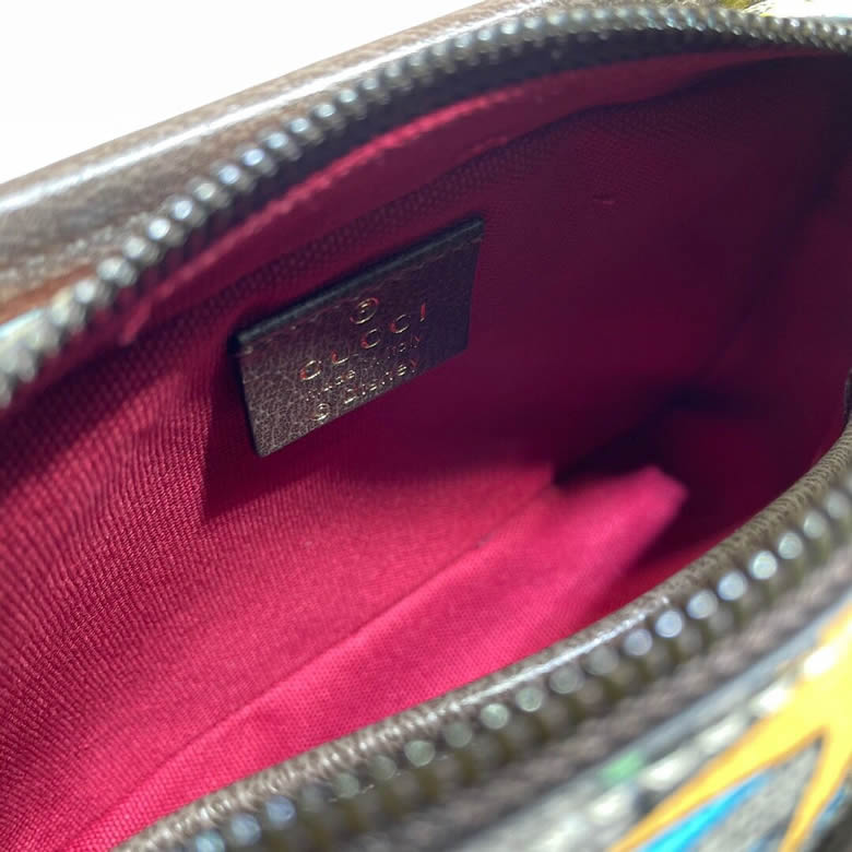 原單GUCCI古馳Disney x唐老鴨印花手拿包 647929￥980.00的图片-高仿古奇包包Gucci、高仿古奇錢包Gucci