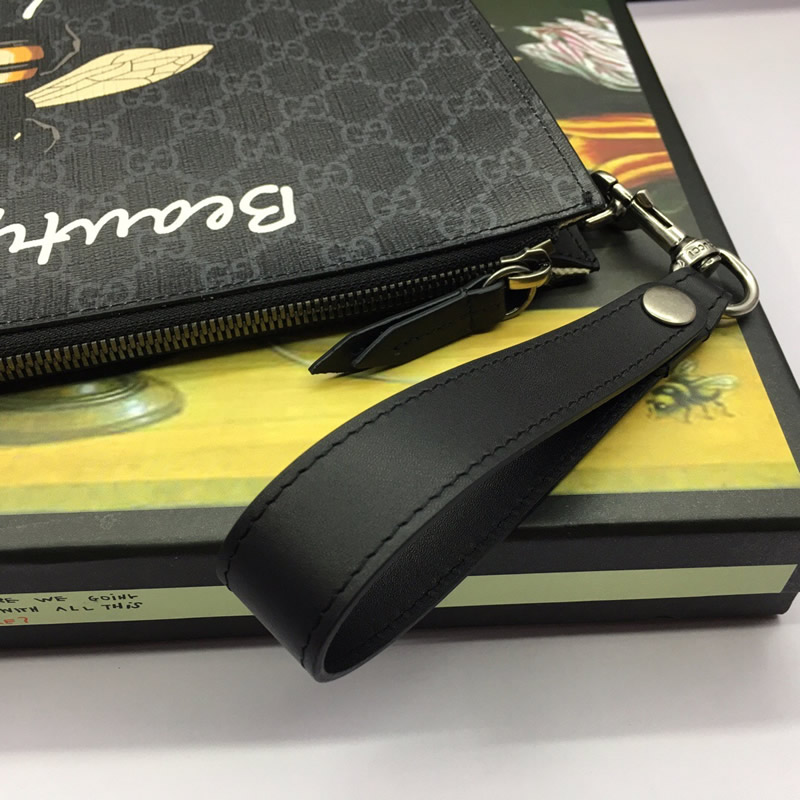 GUCCI/古馳蜜蜂印花GG Supreme人造帆佈中性款式手拿包473904黑色￥880.00的图片-高仿古奇包包Gucci、高仿古奇錢包Gucci