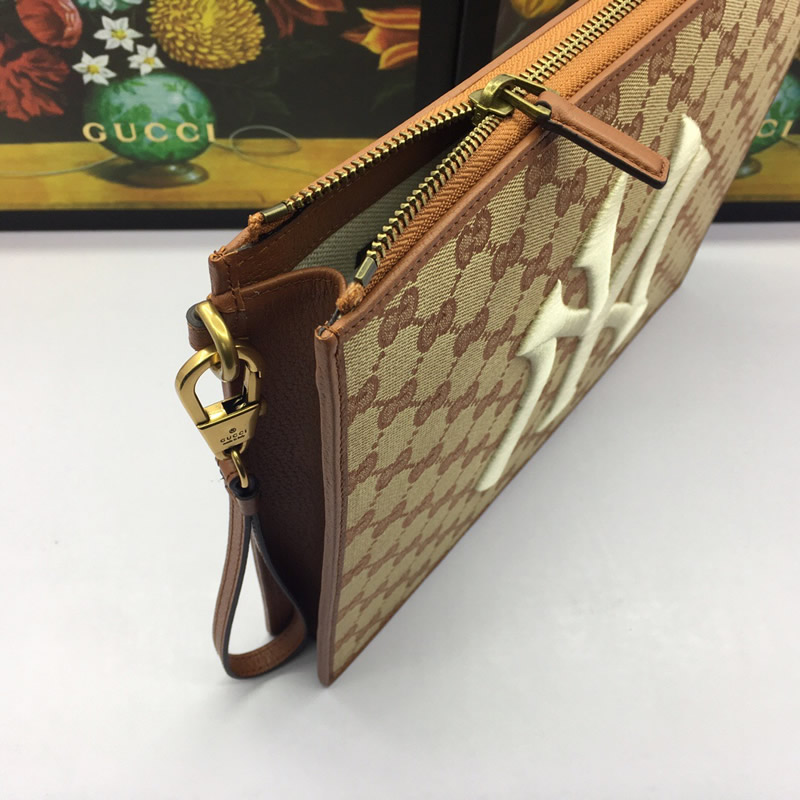 高仿GUCCI古馳男包手包NY Yankees 手拿包547796 9Y9ET 9573淺棕￥980.00的图片-高仿古奇包包Gucci、高仿古奇錢包Gucci