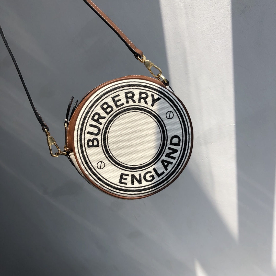 B家路易威登LV雙拉圓餅包高仿包包款可斜背或卸下背帶締造手拿包造型的图片-高仿LV包包、高仿lv女包