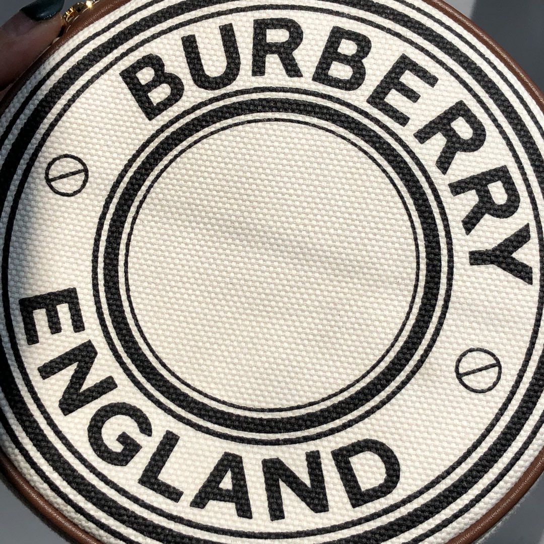 B家路易威登LV雙拉圓餅包高仿包包款可斜背或卸下背帶締造手拿包造型的图片-高仿LV包包、高仿lv女包