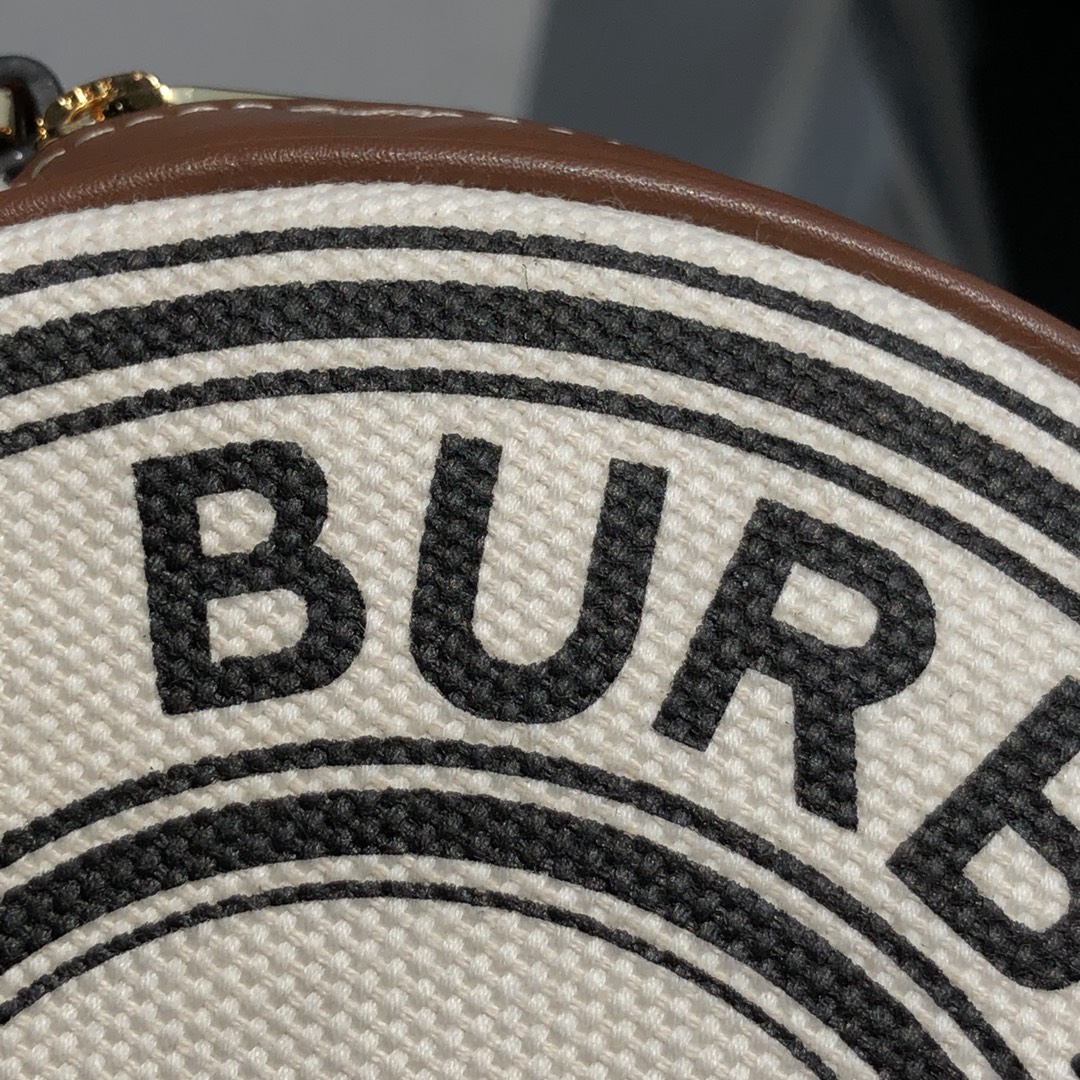 B家路易威登LV雙拉圓餅包高仿包包款可斜背或卸下背帶締造手拿包造型的图片-高仿LV包包、高仿lv女包